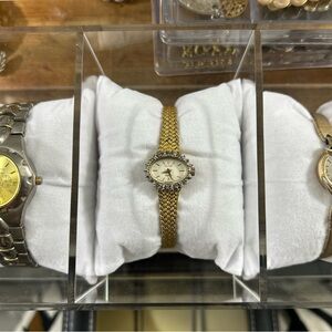 Elegant Gold Watch with Diamond Accents